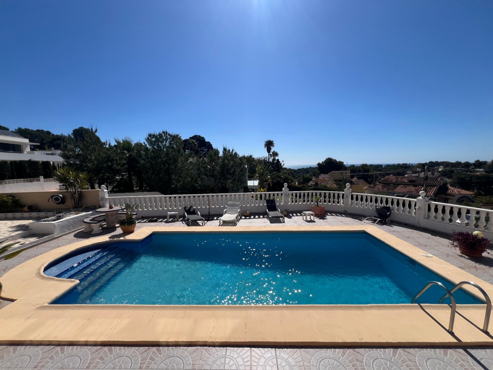 Private swimming pool with sea views at Mediterranean villa in Buena Vista Benissa