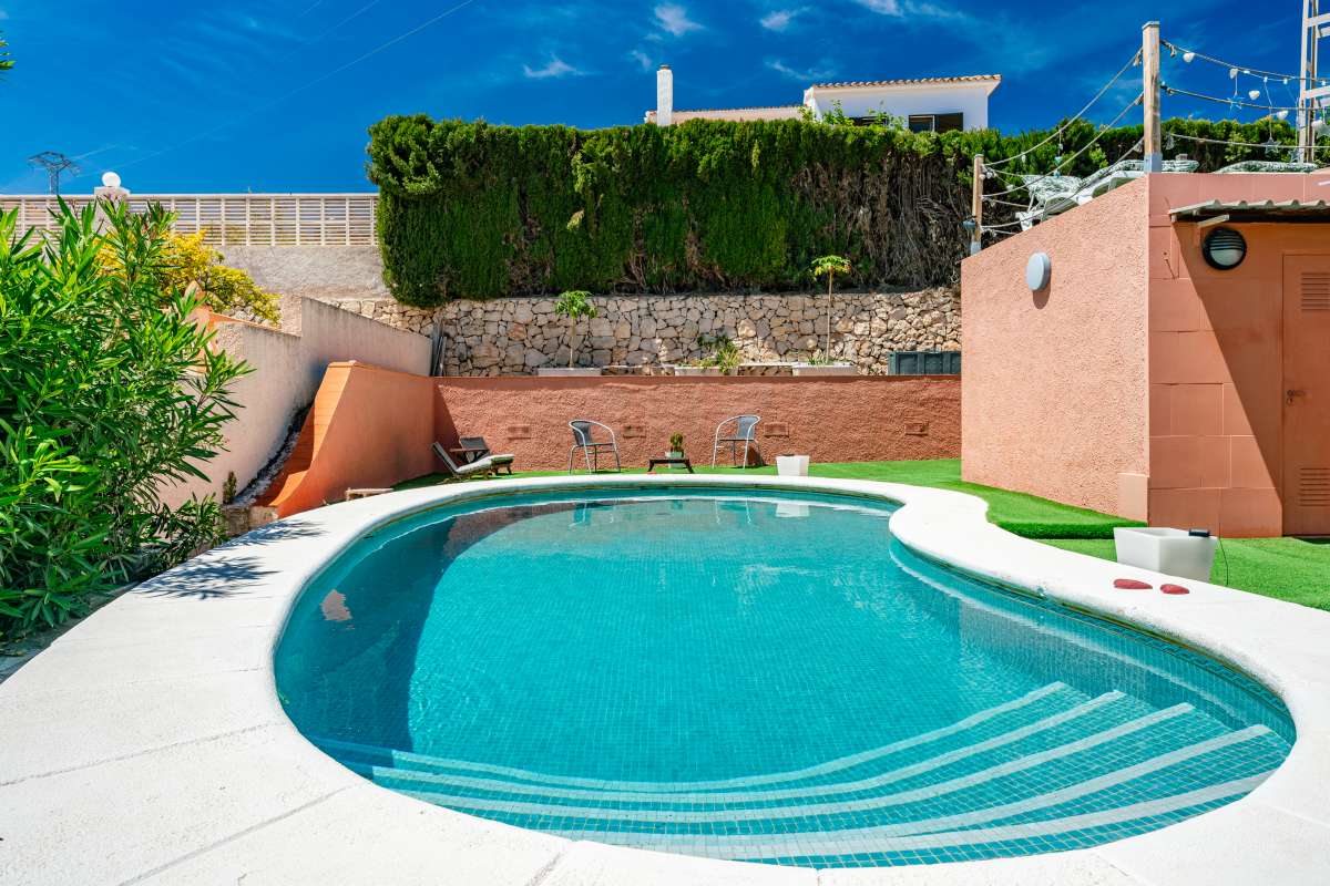 Private swimming pool with terrace area at a renovated Mediterranean villa in La Cometa, Calpe.