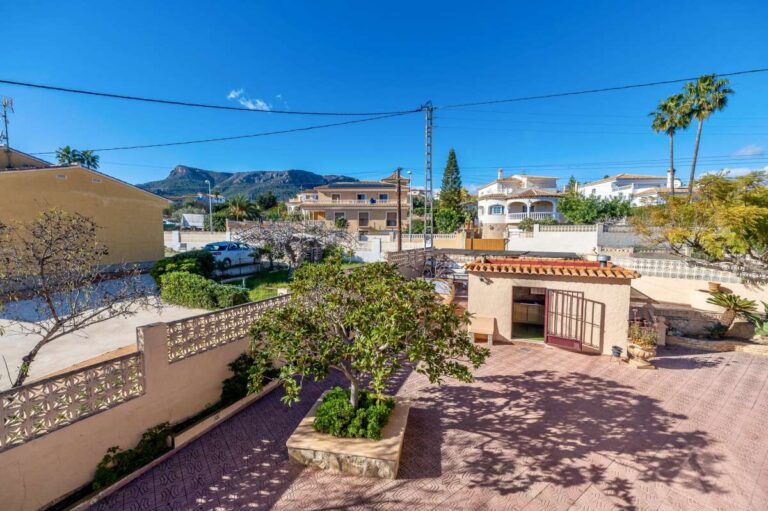 Private terrace with open views across Calpe and the surrounding mountains at a spacious villa with guest apartments.