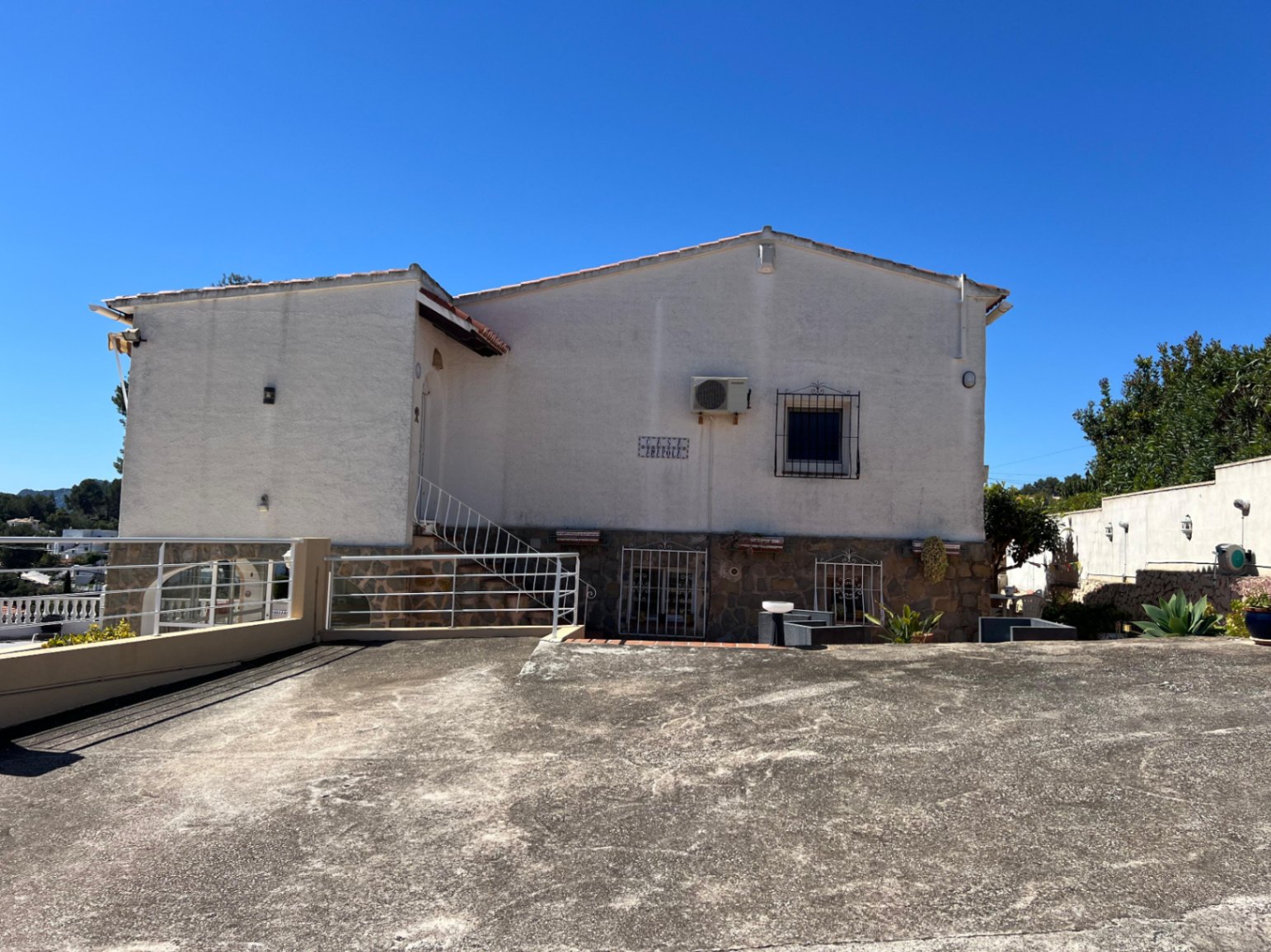 Rear exterior and driveway area at Mediterranean villa in Benissa