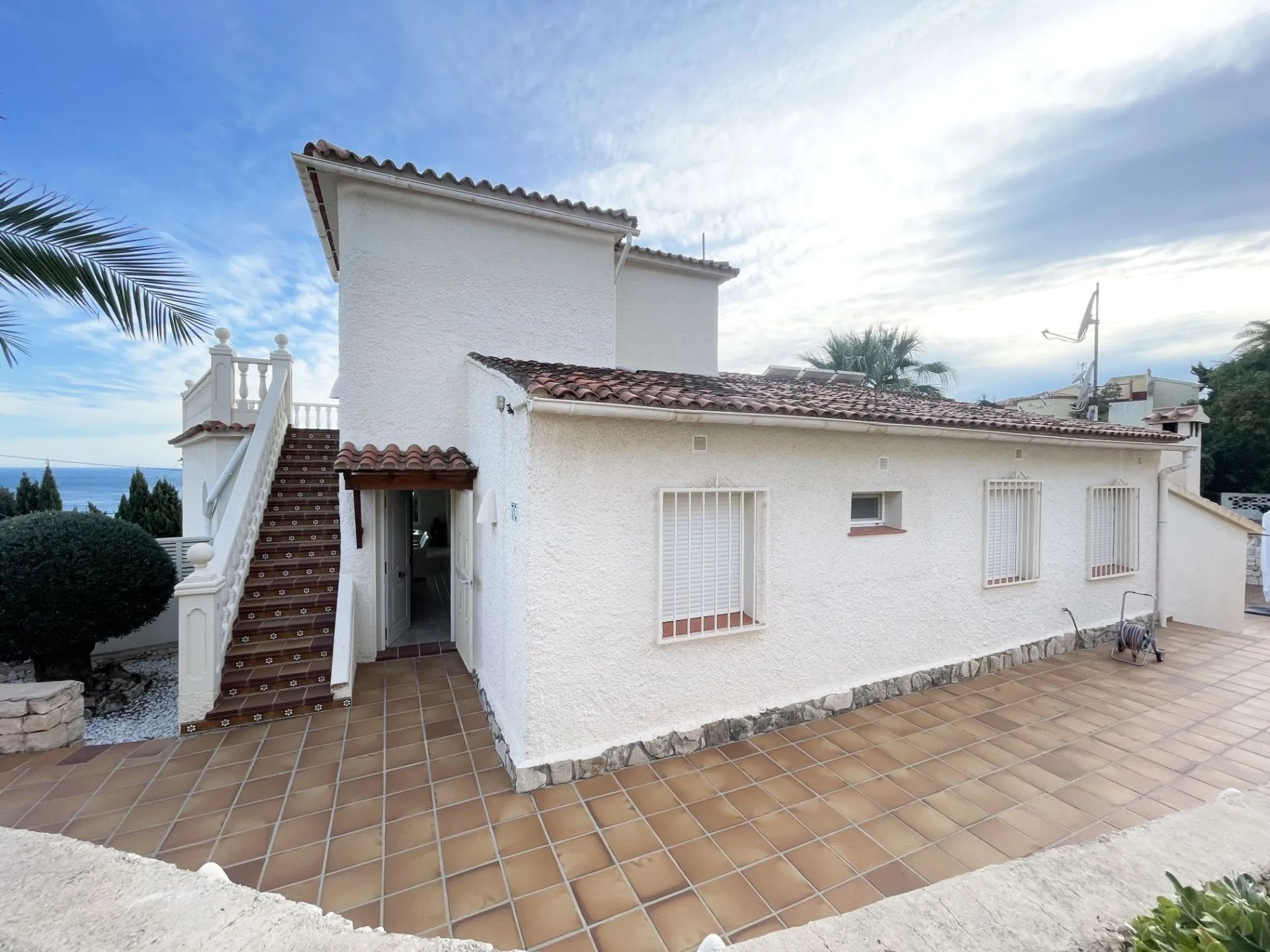 Renovated villa exterior with upper terrace and sea views in Calpe
