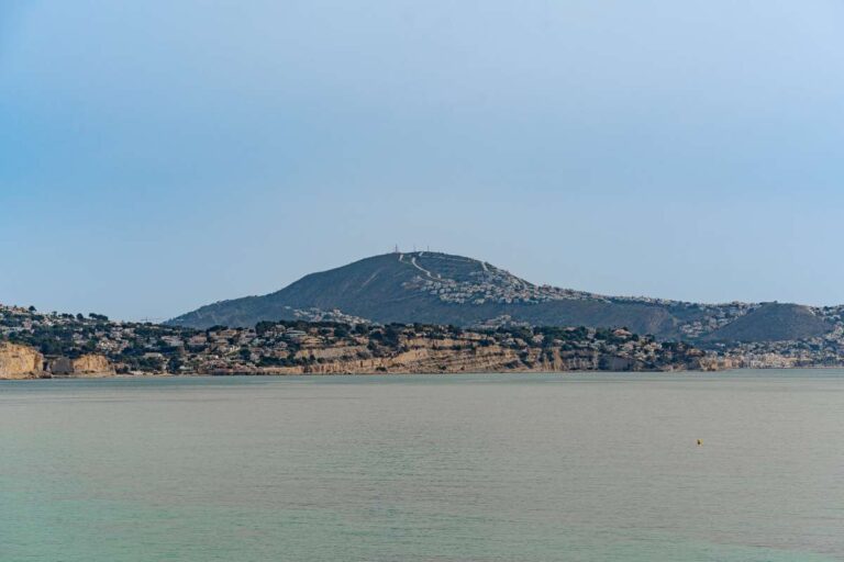 Sea views from a beachfront apartment by La Fossa Beach in Calpe looking across the bay towards the surrounding coastline