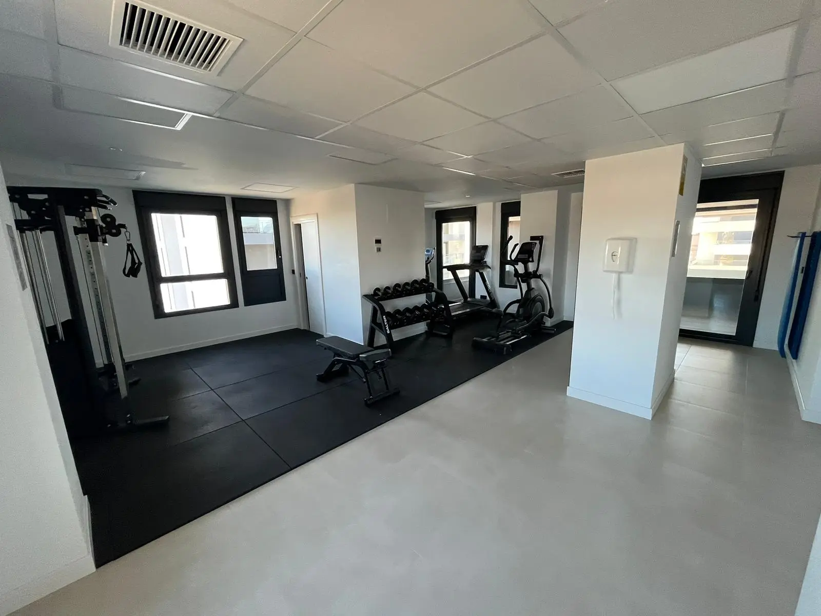 Shared gym and wellness area at modern penthouse complex in Calpe