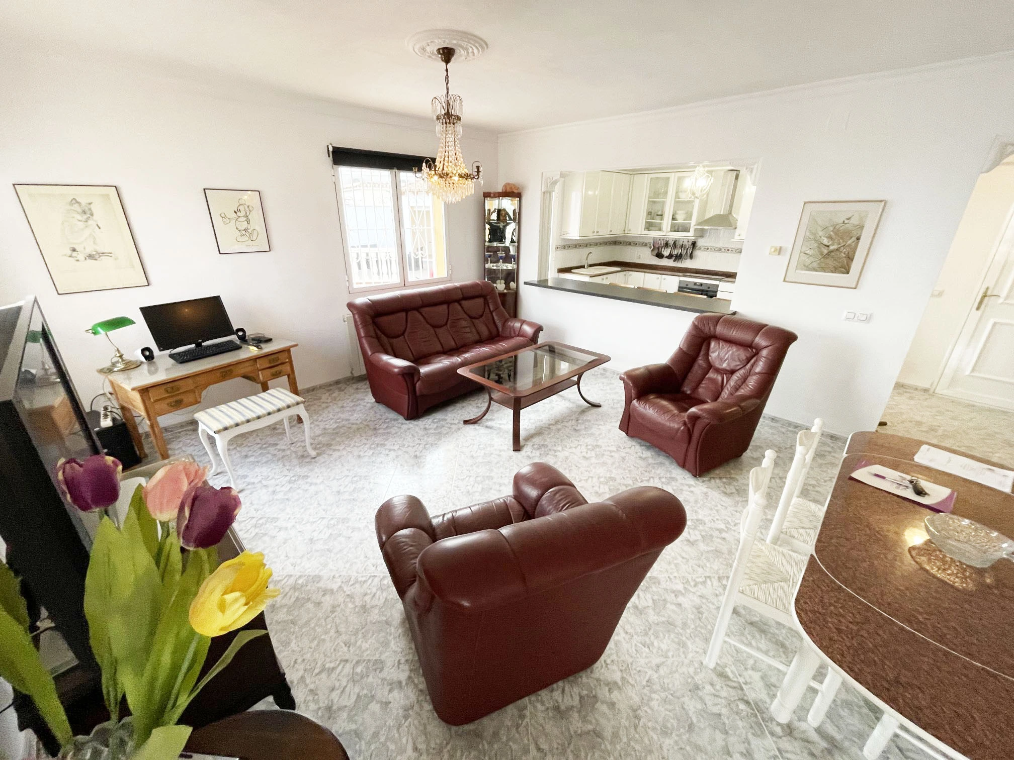 Spacious living room with dining area at detached villa in Calpe