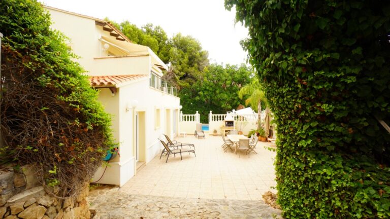 Spacious terrace and garden area at a villa in La Fustera near the sea.