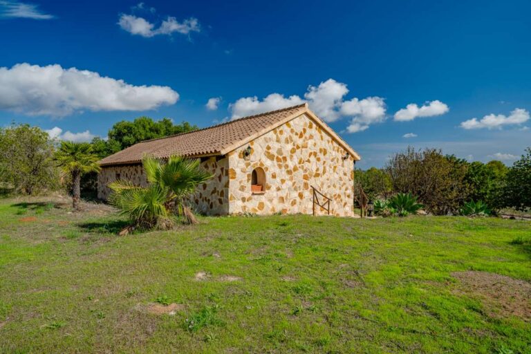 Stone outbuilding at a historic finca in Benissa with surrounding garden, countryside setting and traditional Mediterranean character