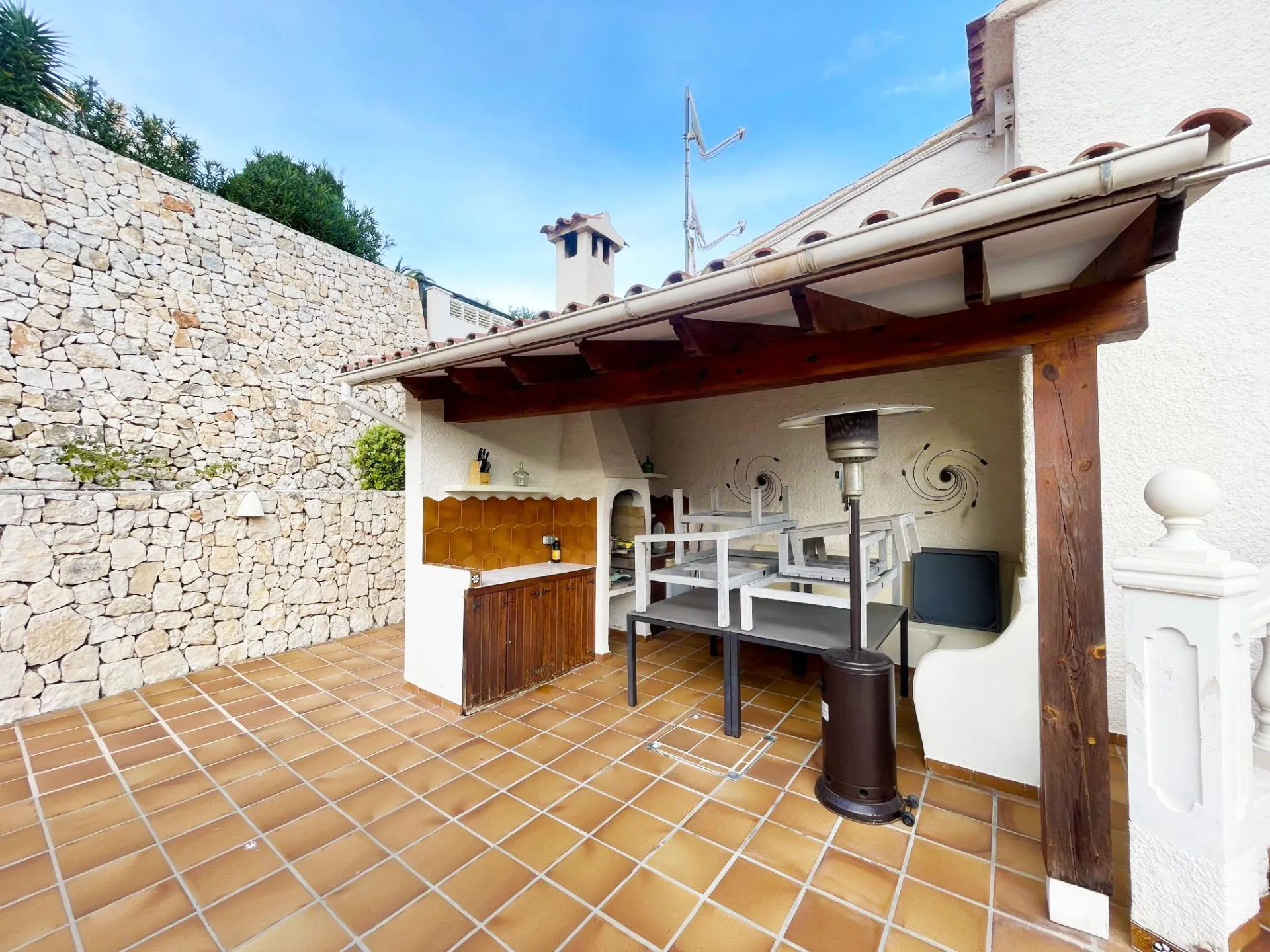 Summer kitchen and barbecue area at renovated villa in Calpe