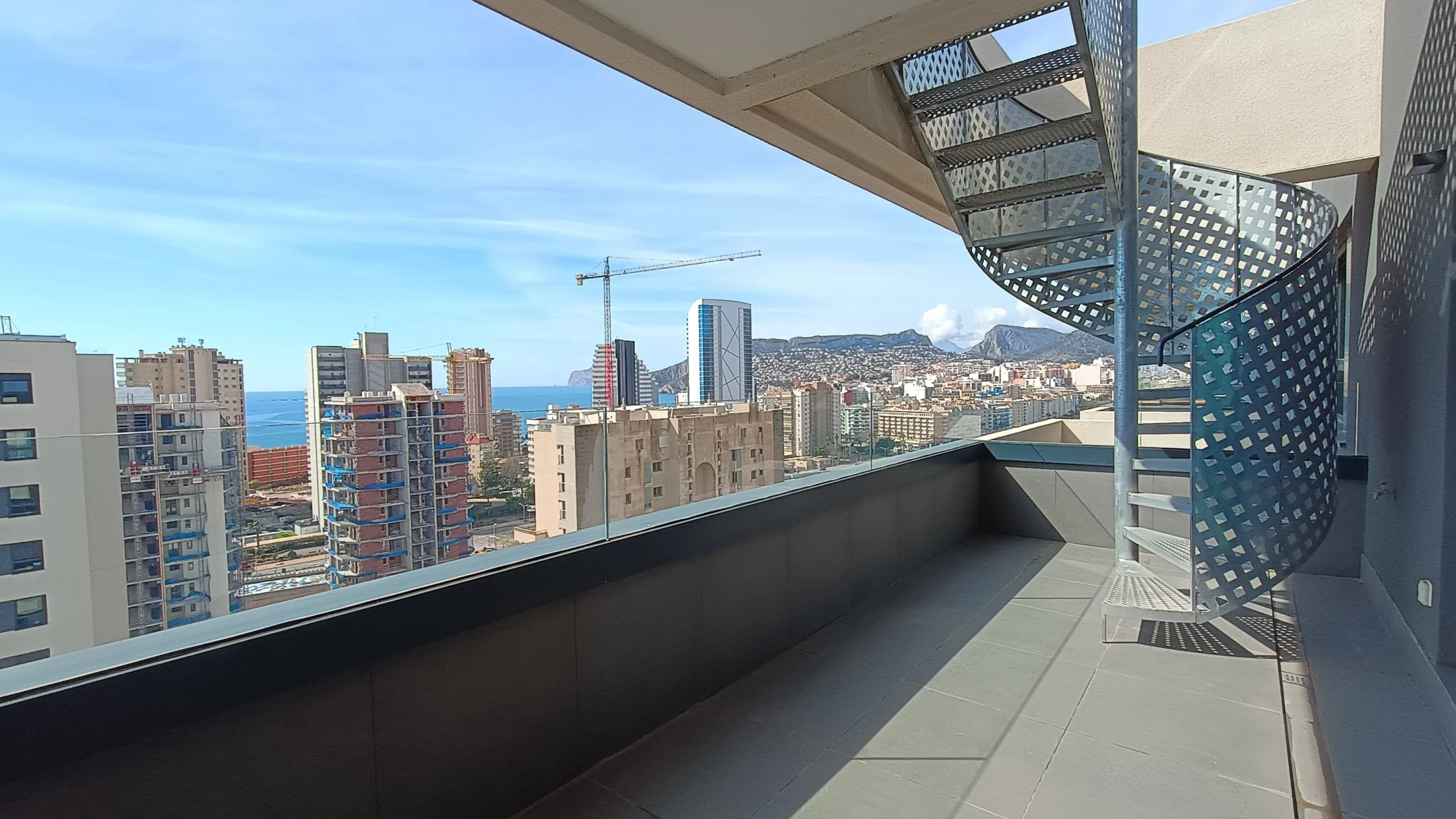 Terrace with sea views and Calpe skyline at modern luxury penthouse
