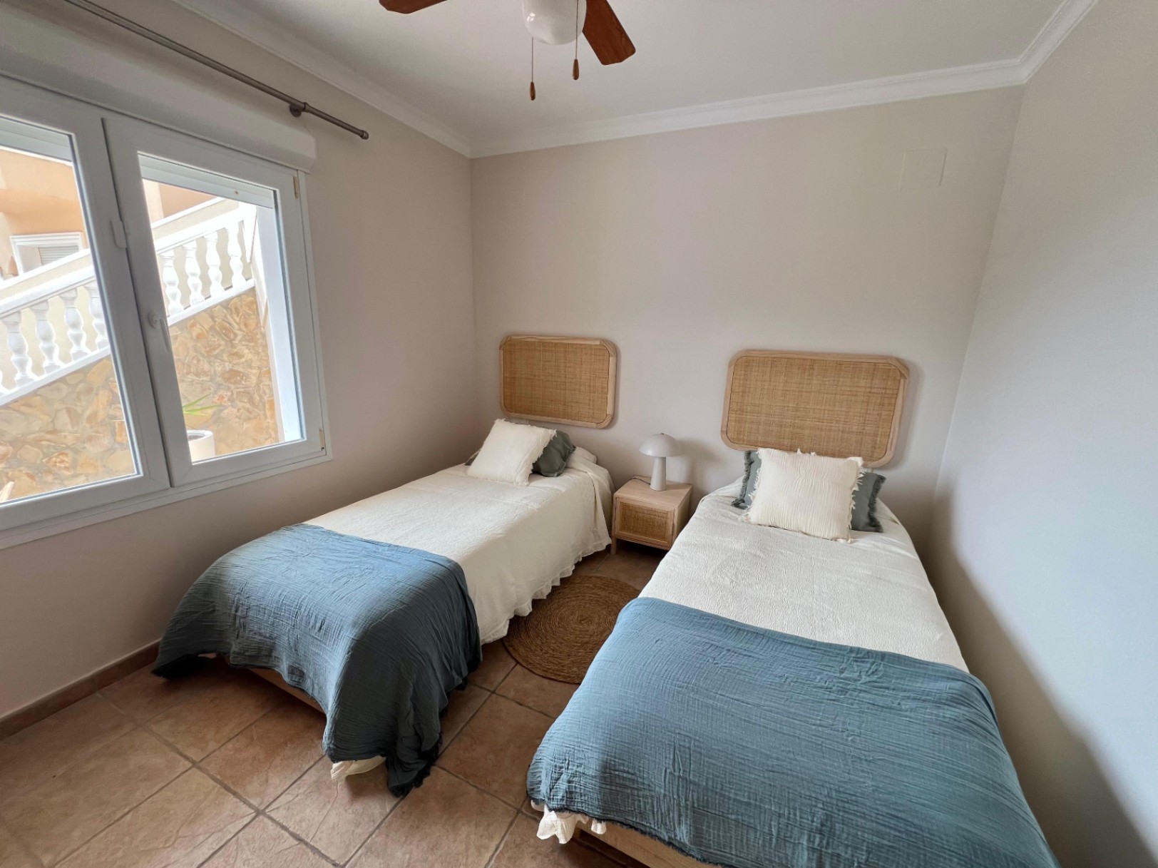 Twin bedroom at modern three-level villa in Moraira
