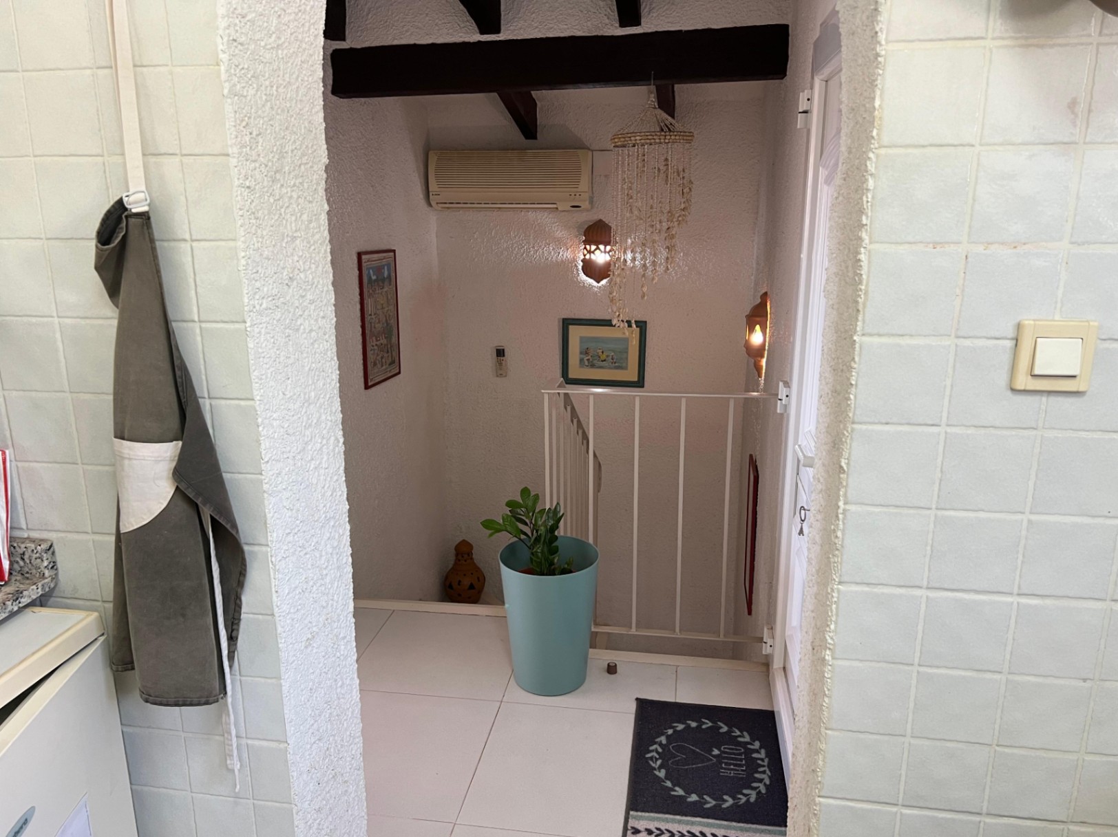 Utility entrance and storage area at Mediterranean villa in Benissa