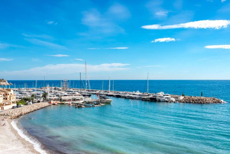 Views from a frontline beach duplex in Mascarat, Altea showing the marina, turquoise Mediterranean Sea, beach and coastline