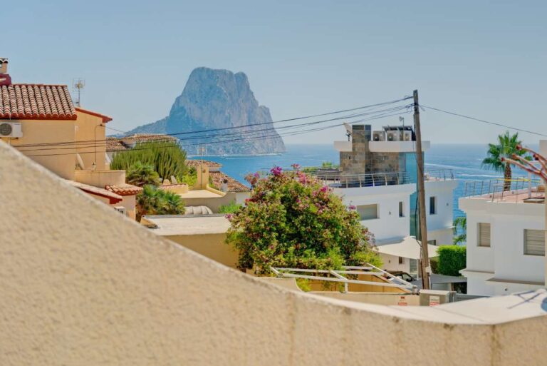 Views towards the Peñón de Ifach and the sea from a second line Mediterranean villa near Puerto Blanco in Calpe.