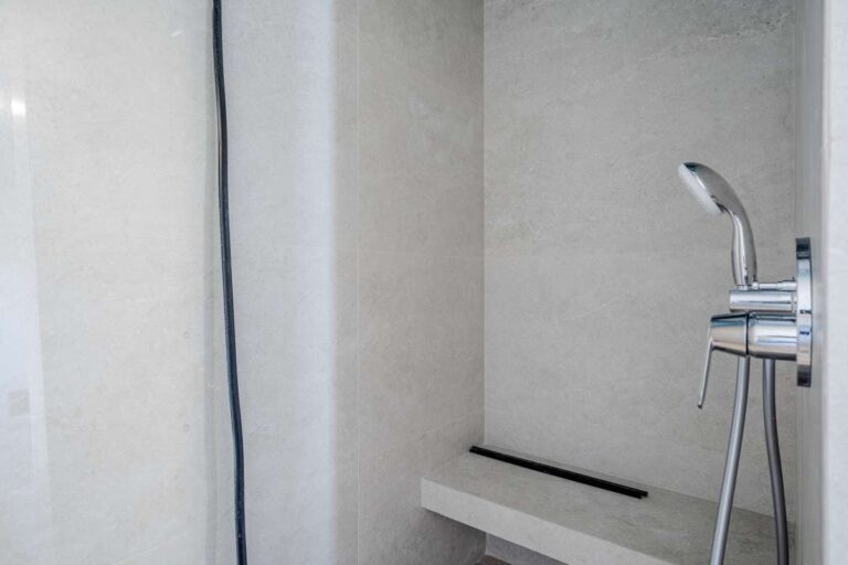 Walk-in shower with modern fixtures inside a new build villa for sale in Calpe