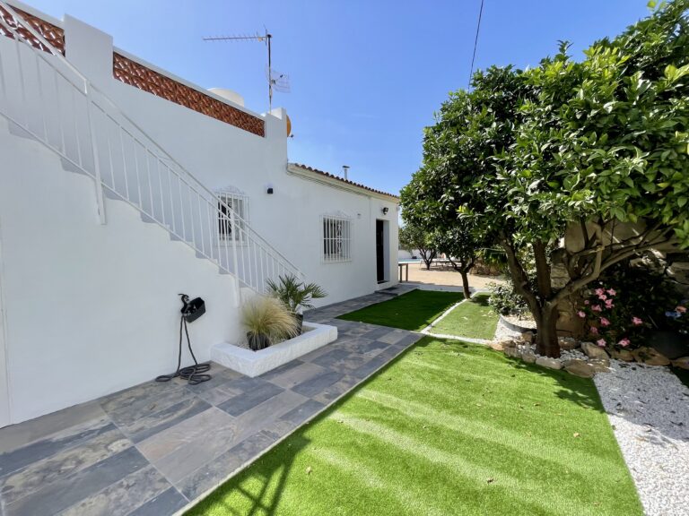 Mediterranean garden with fruit trees and low-maintenance outdoor space at a Calpe villa