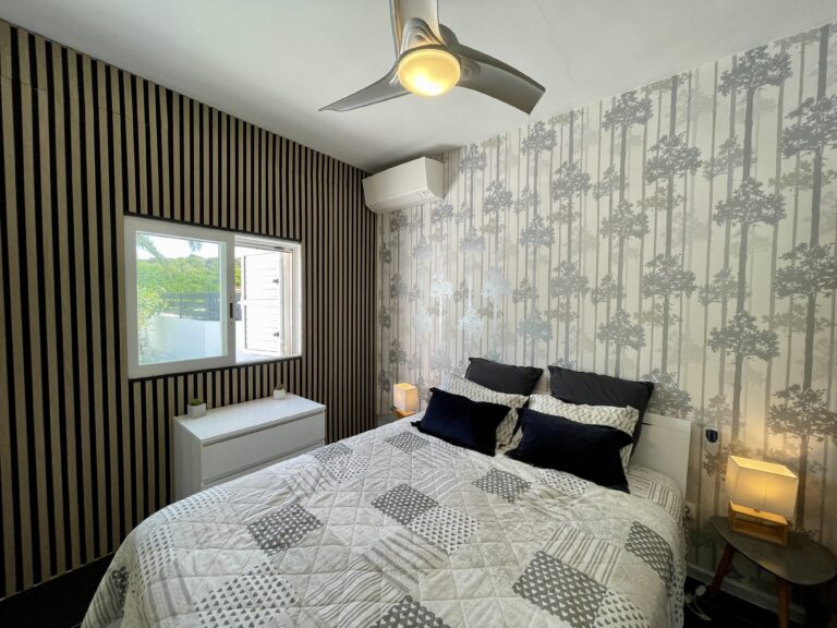 Principal bedroom with ceiling fan and air conditioning in a villa for sale in Calpe