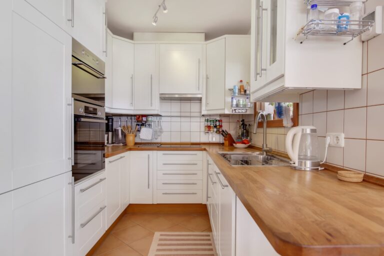 Fully equipped kitchen with wooden worktops in a villa for sale in Calpe