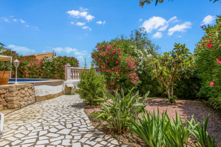 Mediterranean garden and pathway at a sea view villa for sale in Calpe