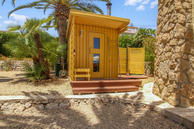 Private sauna in the Mediterranean garden of a villa for sale in Calpe