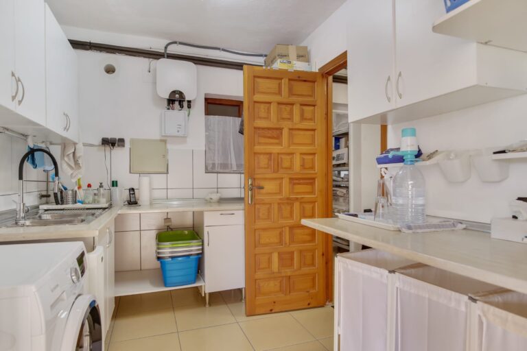 Utility and laundry room with storage in a sea view villa for sale in Calpe